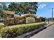 The Preserve at Sundance entrance features stone pillars and lush landscaping at 2415 Brownwood Dr, Mulberry, FL 33860