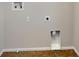 Practical laundry area with tile flooring and visible hookups for appliances at 2415 Brownwood Dr, Mulberry, FL 33860