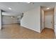 Inviting living space with tile flooring, open layout, and easy access to the entry and backyard at 2415 Brownwood Dr, Mulberry, FL 33860