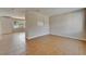Open living room area featuring tile flooring and neutral walls, offering a versatile living space at 2415 Brownwood Dr, Mulberry, FL 33860