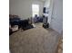 Bedroom with neutral carpet, plenty of natural light, and ample space for work and play at 1204 Berry Ln, Davenport, FL 33837