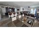 Open-concept living space featuring a modern kitchen, dining area, and comfortable living room at 1204 Berry Ln, Davenport, FL 33837