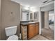 The bathroom features a single sink vanity and adjacent toilet at 1480 E Davidson St, Bartow, FL 33830
