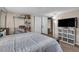 Bedroom with a large bed and shelving unit at 1480 E Davidson St, Bartow, FL 33830