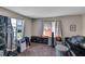 Cozy bedroom with ample natural light, neutral walls and plush carpet at 1480 E Davidson St, Bartow, FL 33830