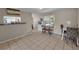 Bright dining room features a music setup and exterior views at 1480 E Davidson St, Bartow, FL 33830