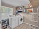 A laundry room with a washing machine and dryer at 1480 E Davidson St, Bartow, FL 33830