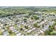 Expansive aerial view of a residential community with neatly arranged homes and greenery at 1610 Reynolds Rd # 353, Lakeland, FL 33801