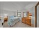 Relaxing bedroom features a comfortable bed, natural light, and a dresser, creating a serene atmosphere at 1610 Reynolds Rd # 353, Lakeland, FL 33801