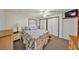 Comfortable bedroom with a cozy bed, dresser, and closet space, offering a relaxing retreat at 1610 Reynolds Rd # 353, Lakeland, FL 33801