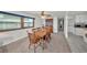 Charming dining area with a wooden table set perfect for Gathering meals and gatherings at 1610 Reynolds Rd # 353, Lakeland, FL 33801