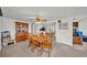 Cozy dining area features a wooden table, perfect for enjoying meals with Gathering and friends at 1610 Reynolds Rd # 353, Lakeland, FL 33801