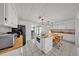 Eat-in kitchen with bright white cabinets, wood countertops and updated appliances, and lots of light at 1610 Reynolds Rd # 353, Lakeland, FL 33801