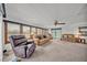 Bright and airy living room with comfortable sofas and natural light, perfect for relaxation at 1610 Reynolds Rd # 353, Lakeland, FL 33801