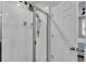 Walk-in shower showing tile walls and a glass door at 1859 Carnostie Rd, Winter Haven, FL 33884