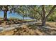 Scenic community walking path lined with mature trees and natural landscaping at 6918 Lake Eaglebrooke Dr, Lakeland, FL 33813