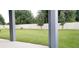 A well maintained backyard surrounded by a white fence at 753 Grand Hilltop Dr, Apopka, FL 32703