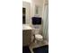 Bathroom featuring a white toilet, neutral color vanity and blue accents at 753 Grand Hilltop Dr, Apopka, FL 32703