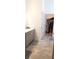 Bathroom featuring a large mirror, vanity, and access to a walk-in closet at 753 Grand Hilltop Dr, Apopka, FL 32703