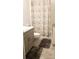 Bathroom featuring a white toilet, neutral color vanity and gray accents at 753 Grand Hilltop Dr, Apopka, FL 32703