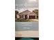 Hilltop Reserve exterior elevation includes a two-car garage and well-manicured lawn at 753 Grand Hilltop Dr, Apopka, FL 32703