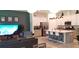 Open-concept living area features a spacious kitchen, cozy seating, and modern decor at 753 Grand Hilltop Dr, Apopka, FL 32703