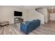 Cozy living room features modern furnishings, a decorative fireplace, and neutral décor at 1646 Seth Dr, Winter Haven, FL 33880
