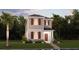 Charming two-story home with stone accents, neat lawn, and attractive landscaping at 1880 Bright Sky Dr, Kissimmee, FL 34744