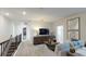 Cozy upstairs loft area with comfortable seating and stylish decor at 1911 Clear Sky Dr, Kissimmee, FL 34744