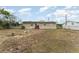 Large backyard with fire pit at 222 Aldo Dr, Babson Park, FL 33827
