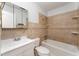 Bright bathroom features a vanity, bathtub and shower, and updated fixtures at 222 Aldo Dr, Babson Park, FL 33827