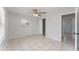 Bedroom with a ceiling fan, closet, tiled floor, and natural light at 222 Aldo Dr, Babson Park, FL 33827