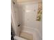 Simple bathroom with white tiled shower and tub at 730 Citrus St, Orlando, FL 32805
