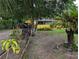 Exterior shot of the house with landscaping and a driveway at 730 Citrus St, Orlando, FL 32805