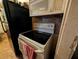 Kitchen stove and microwave with tiled backsplash at 730 Citrus St, Orlando, FL 32805