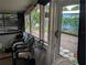 Enclosed porch area featuring comfortable seating and natural light at 730 Citrus St, Orlando, FL 32805