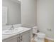 Clean half-bathroom with light countertops and neutral walls at 1620 Ellesmere Ave, Haines City, FL 33844