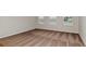Carpeted bedroom features bright windows and neutral walls at 1620 Ellesmere Ave, Haines City, FL 33844