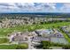 Golf course community features clubhouse, pool, tennis courts, and manicured landscapes at 6229 Raven Run, Lakeland, FL 33809