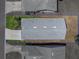 High-angle view outlines property; reveals roof, landscaping, and surrounding neighborhood in a clear delineation at 6229 Raven Run, Lakeland, FL 33809