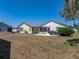 The home features a well-maintained backyard, patio, and grill, ideal for outdoor relaxation at 6229 Raven Run, Lakeland, FL 33809