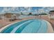 Relaxing community hot tub and pool area featuring comfortable lounge seating and a tranquil setting at 6229 Raven Run, Lakeland, FL 33809