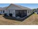 Home exterior showing a screened lanai offers a relaxing outdoor space at 6229 Raven Run, Lakeland, FL 33809