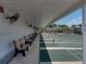 Covered shuffleboard courts with benches, offering a cool and shaded space for recreational activities at 6229 Raven Run, Lakeland, FL 33809