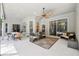 Covered patio with ample seating and an outdoor ceiling fan at 917 Keep Way Loop, Oviedo, FL 32765