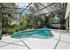 Relaxing screened-in pool area with well-manicured landscaping, perfect for outdoor enjoyment at 917 Keep Way Loop, Oviedo, FL 32765