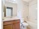 Bathroom featuring wood vanity, single sink, and a shower-tub combo at 1705 Plantation Pointe Dr, Orlando, FL 32824