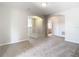 Upstairs loft featuring neutral carpet, access to rooms and staircase with white railings at 1705 Plantation Pointe Dr, Orlando, FL 32824