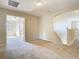 Upstairs landing with carpeted flooring, arches and access to bedrooms and bathrooms at 1705 Plantation Pointe Dr, Orlando, FL 32824