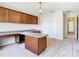 This spacious home office features custom built-in shelving and cabinetry at 1705 Plantation Pointe Dr, Orlando, FL 32824